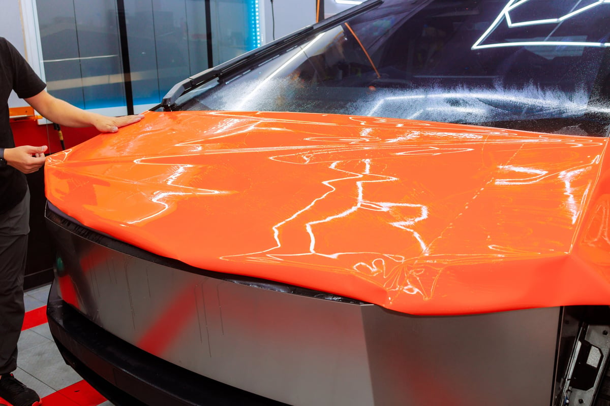 Orange vinyl wrap applied to vehicle