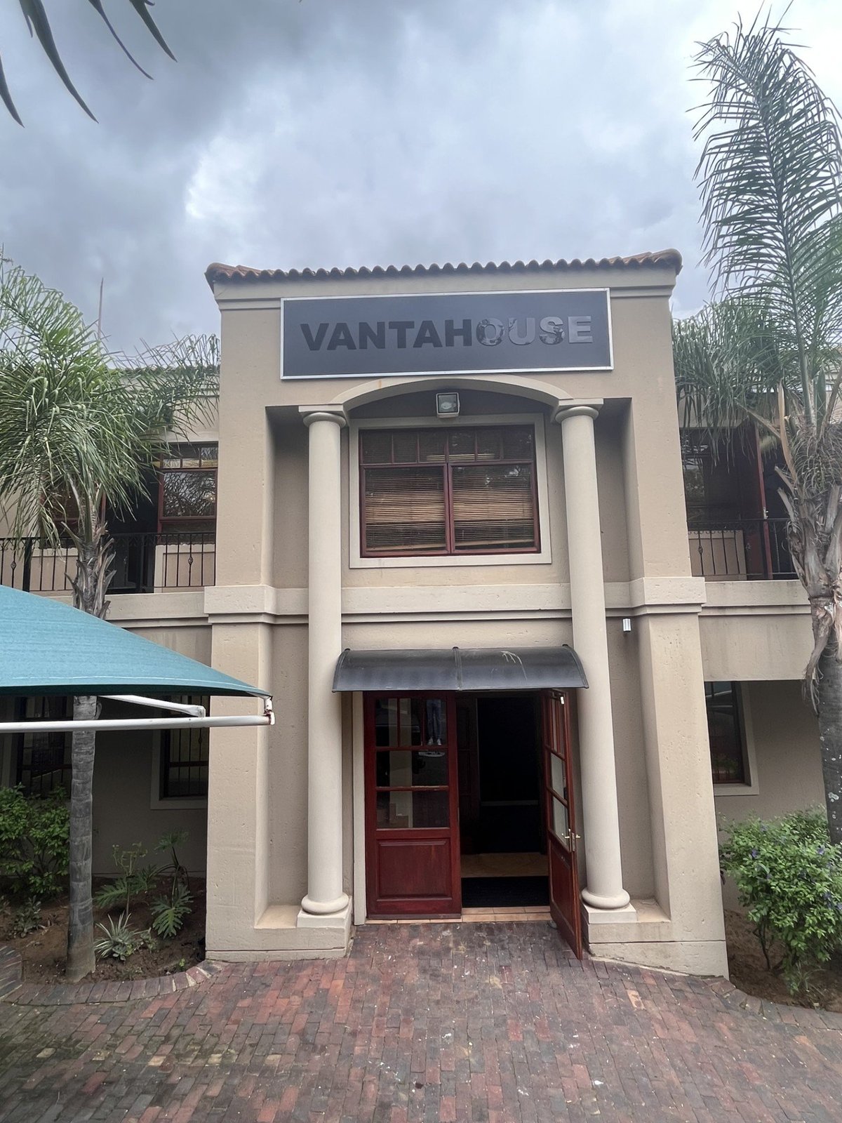 Illuminated light box fascia sign reading Vantage House mounted above a shopfront entrance, an example of an LED light box sign installed by Imagine Graffix in Pretoria
